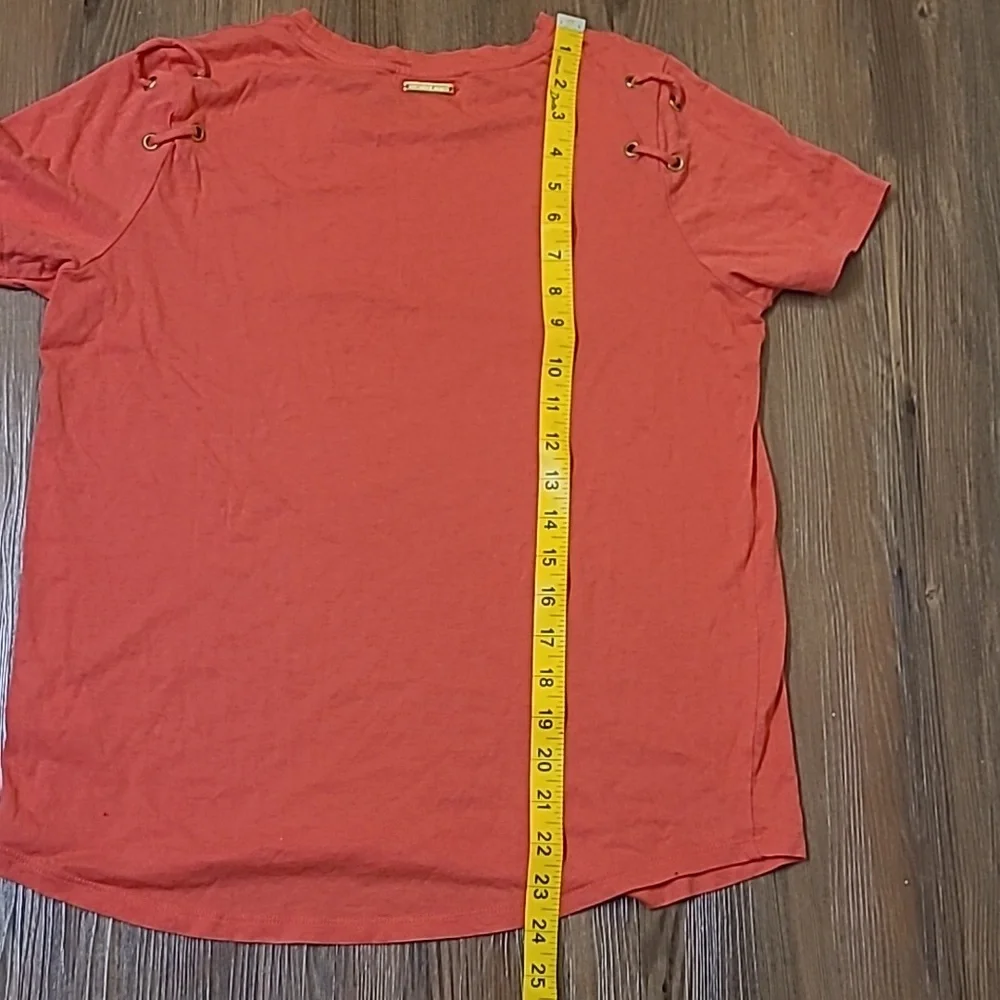 Michael Kors Orange Short Sleeve Top with Lace-Up Detail used good condition‎